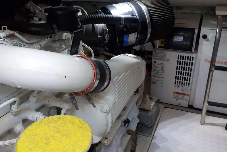 "lady Di" Yacht Photos Pics Engine room of 2009 Tiara Yachts 3900 Open, featuring Cummins Onan generator.