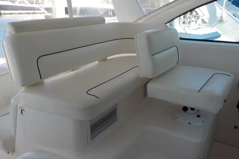"lady Di" Yacht Photos Pics 2009 Tiara Yachts 3900 Open interior seating with white upholstery and blue accents.