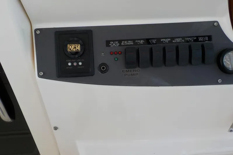 "lady Di" Yacht Photos Pics Control panel of a 2009 Tiara Yachts 3900 Open, featuring switches and an ACR device.