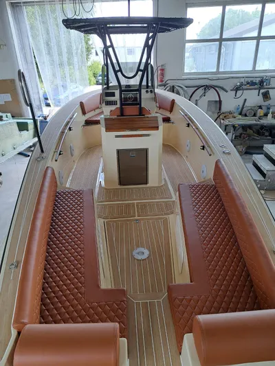  Yacht Photos Pics 2025 Lilybaeum Levanzo 25 Lounge Deck boat with luxurious seating and modern design.