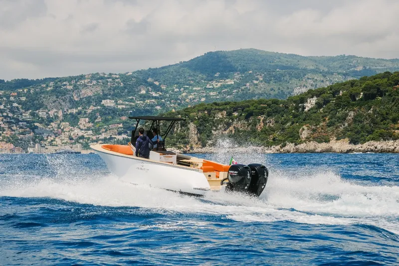  Yacht Photos Pics 2025 Lilybaeum Levanzo 25 Lounge Deck boat cruising on scenic coastal waters.