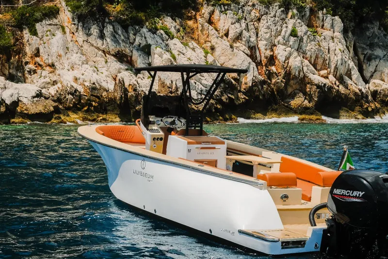  Yacht Photos Pics Lilybaeum Levanzo 25 Lounge Deck boat cruising near rocky coastline, 2025 model.