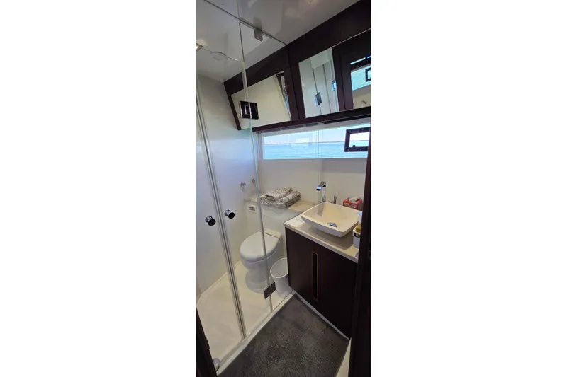 Benellie II Yacht Photos Pics Luxurious bathroom in 2022 Galeon 500 Fly yacht, featuring modern fixtures and elegant design.
