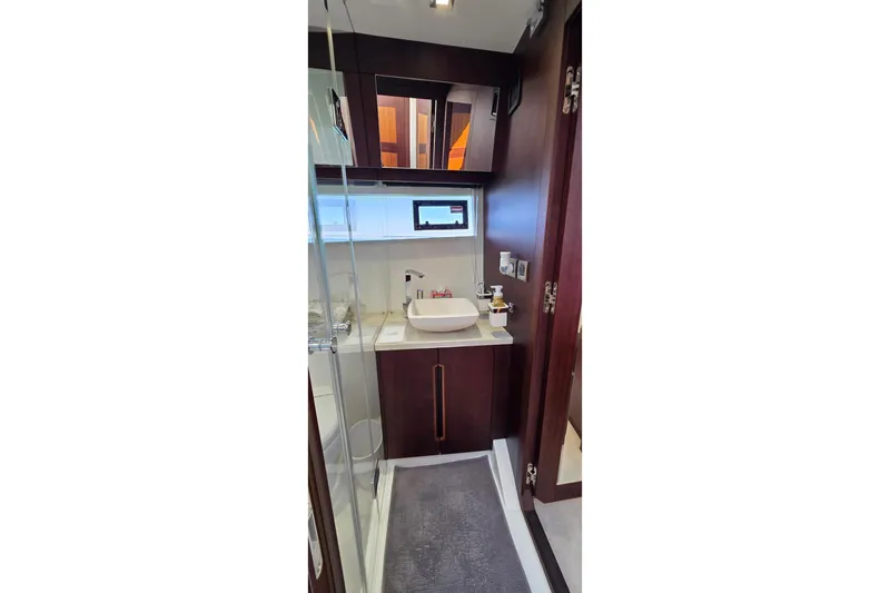 Benellie II Yacht Photos Pics Luxurious bathroom interior of 2022 Galeon 500 Fly yacht with modern fixtures.
