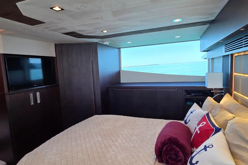 Benellie II Yacht Photos Pics Luxurious bedroom interior of 2022 Galeon 500 Fly yacht with ocean view.