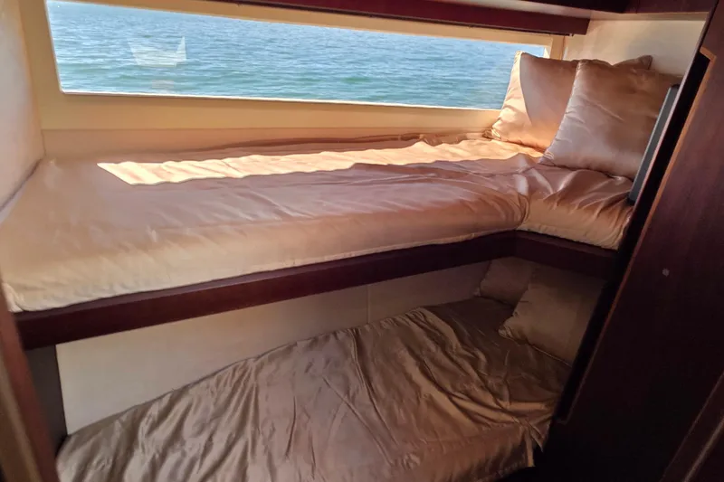 Benellie II Yacht Photos Pics Interior of 2022 Galeon 500 Fly yacht with cozy bunk beds and ocean view.