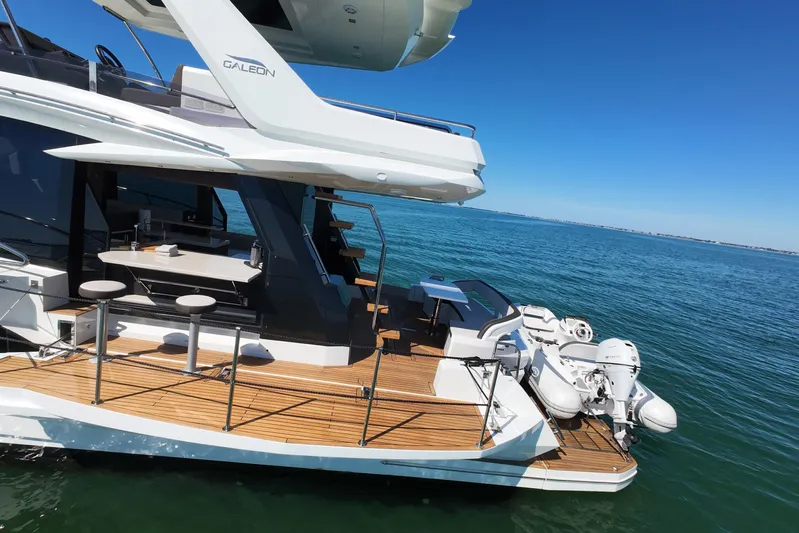 Benellie II Yacht Photos Pics 2022 Galeon 500 Fly yacht with sleek design on calm blue waters.