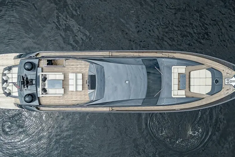 Coal Blooded Yacht Photos Pics Aerial view of 2014 Pershing 92 yacht on calm water.
