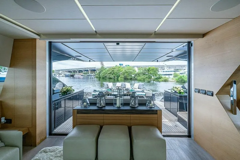 Coal Blooded Yacht Photos Pics Luxurious interior of 2014 Pershing 92 yacht with open deck view.