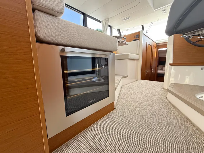 Demo Yacht Photos Pics Interior of 2025 Beneteau Swift Trawler 48, featuring modern design and comfortable seating.