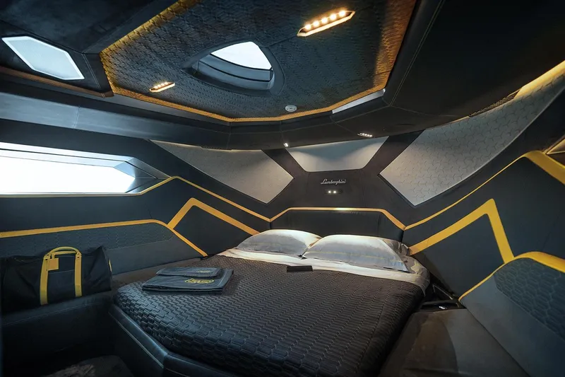  Yacht Photos Pics Luxurious interior of 2026 Tecnomar Lamborghini 63 yacht with modern design and elegant bedding.