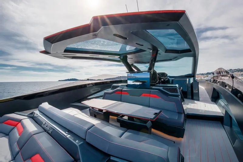  Yacht Photos Pics Luxurious 2026 Tecnomar Lamborghini 63 yacht interior with sleek design and ocean view.