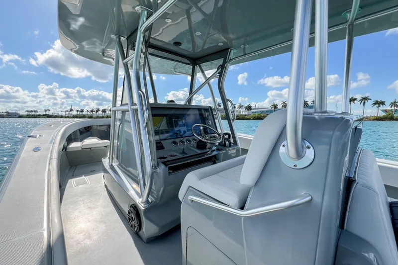  Yacht Photos Pics 2018 SeaVee 390Z boat interior with modern helm, sleek design, and ocean view.