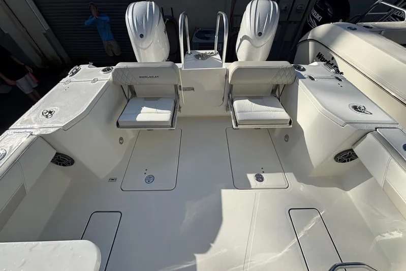  Yacht Photos Pics 2026 World Cat 265 DC-X boat interior with seating and storage compartments.