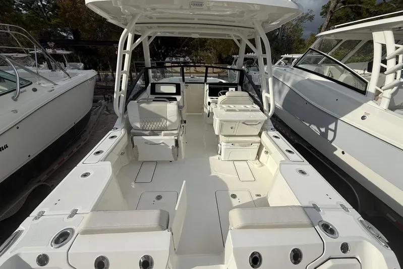  Yacht Photos Pics 2026 World Cat 265 DC-X boat interior with seating and storage compartments.