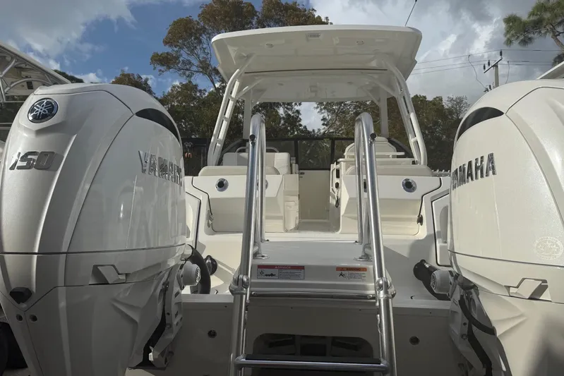  Yacht Photos Pics 2026 World Cat 265 DC-X boat with dual Yamaha 150 engines, rear view.