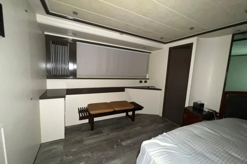 M/y Q Yacht Photos Pics Modern interior of a 2001 Falcon 106 yacht with sleek design and neutral tones.