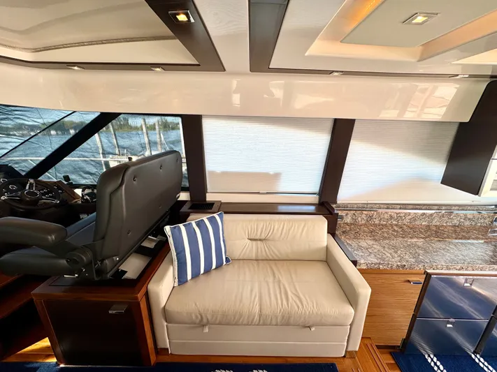 Sneezy Yacht Photos Pics Salon - Starboard Side Seating w/ Breaker Panel Below