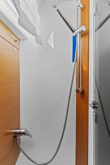 Deep Blue Yacht Photos Pics Shower area in 2020 Jeanneau Sun Odyssey 389 yacht, featuring modern fixtures and sleek design.