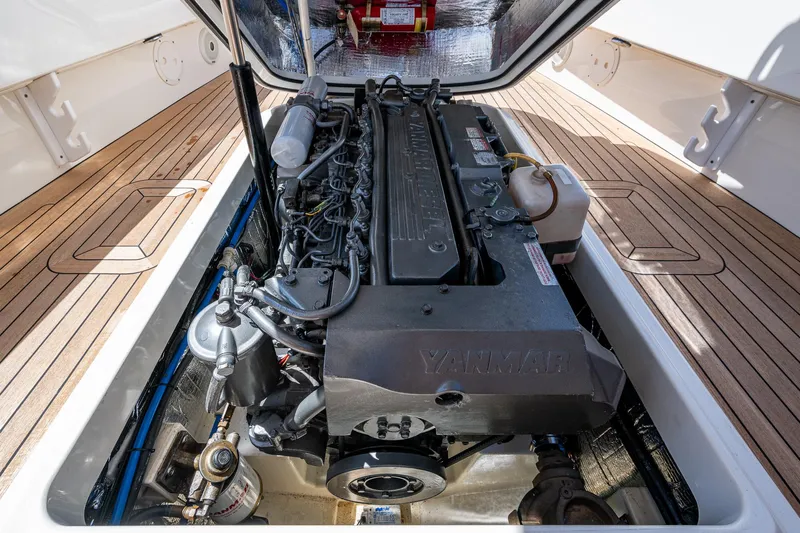 Summer Wind Yacht Photos Pics Engine compartment of a 2003 Hinckley Talaria 29 Center Console boat with Yanmar engine.