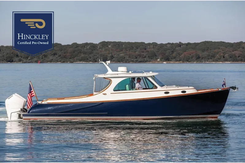 Carol I Yacht Photos Pics 2024 Hinckley 35 boat cruising on calm water, certified pre-owned.