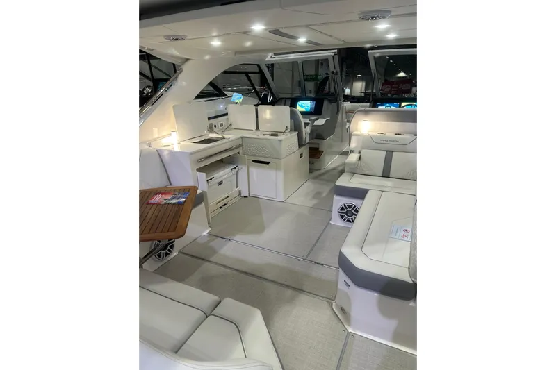  Yacht Photos Pics Luxurious interior of 2025 Regal LS36 boat with modern seating and sleek design.
