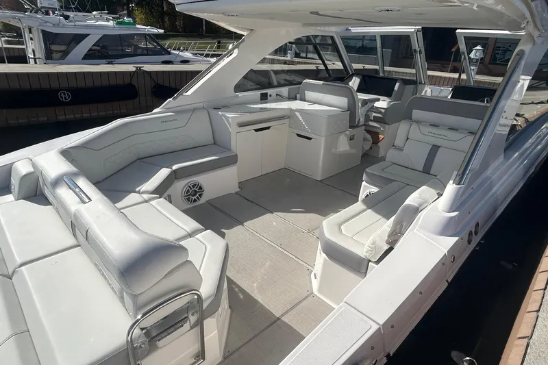  Yacht Photos Pics Luxurious 2025 Regal LS36 boat interior with spacious seating and modern design.