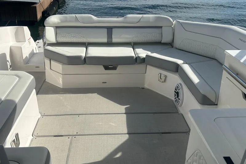  Yacht Photos Pics Luxurious seating area on 2025 Regal LS36 boat, featuring elegant design and waterfront view.
