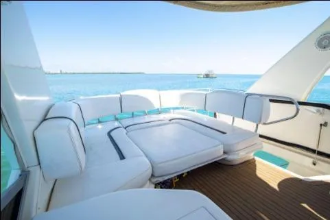 Salty Pause Yacht Photos Pics 2005 Sea Ray 420 Sedan Bridge yacht with spacious deck and ocean view.