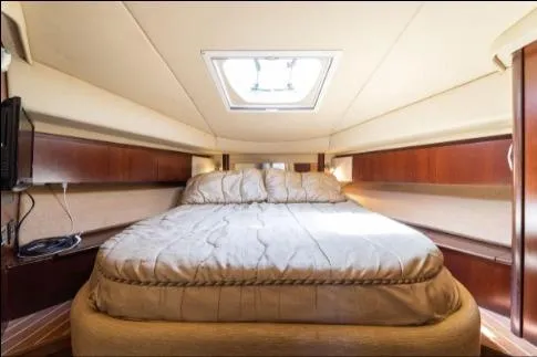 Salty Pause Yacht Photos Pics Luxurious cabin interior of 2005 Sea Ray 420 Sedan Bridge yacht.