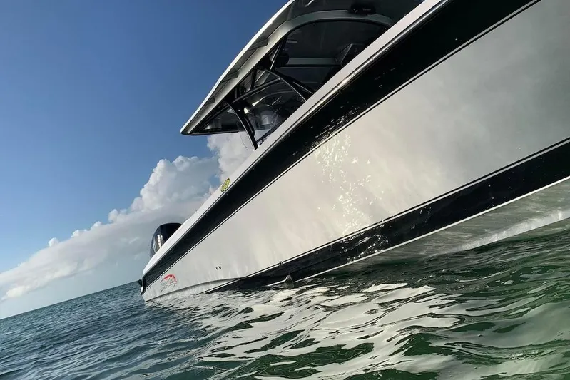  Yacht Photos Pics 2017 Nor-Tech 340 Sport Center Console boat on open water under clear sky.