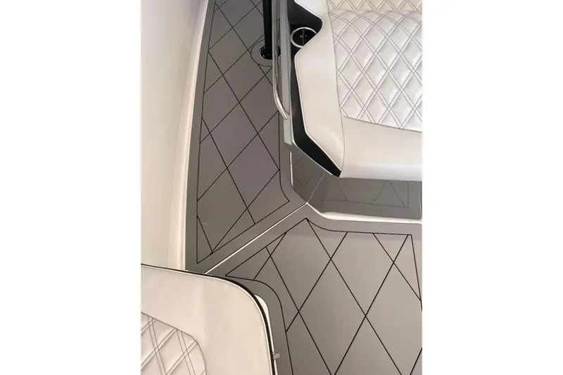  Yacht Photos Pics 2017 Nor-Tech 340 Sport Center Console interior with diamond-stitched seating and sleek flooring design.