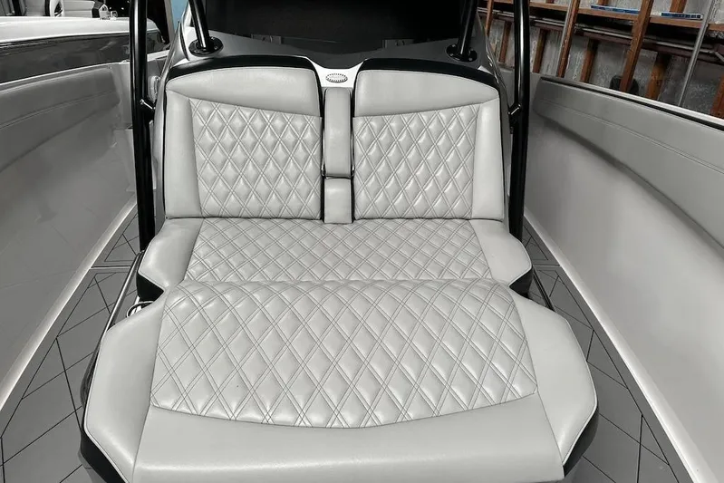  Yacht Photos Pics Luxurious seating on 2017 Nor-Tech 340 Sport Center Console with diamond-stitched upholstery.