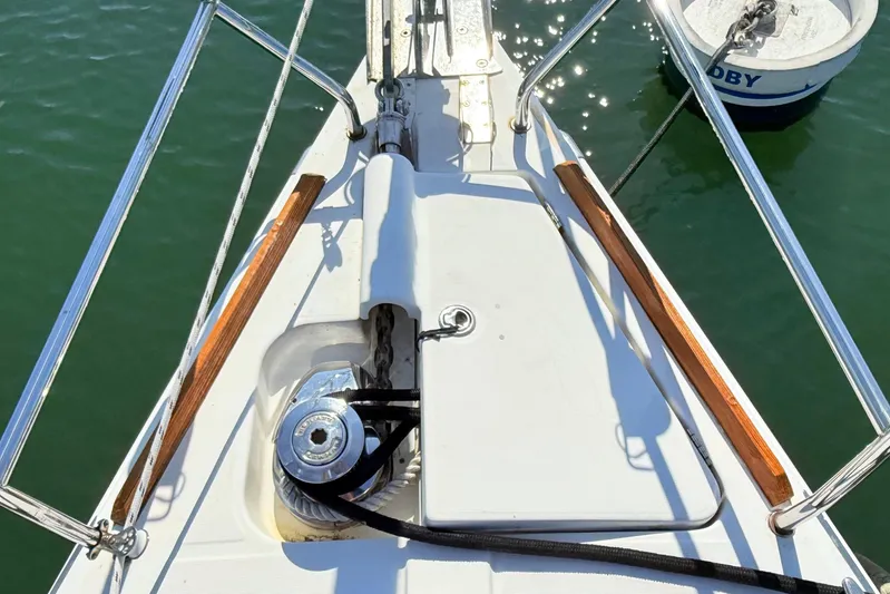 Sunniva Yacht Photos Pics Bow of 2007 Beneteau Oceanis 46 sailboat with anchor and winch system.