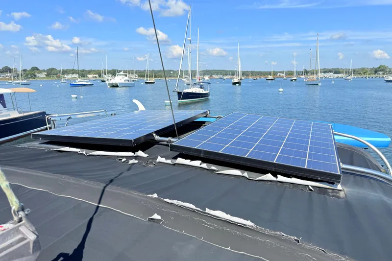 Sunniva Yacht Photos Pics Solar panels on a 2007 Beneteau Oceanis 46 yacht in a marina.