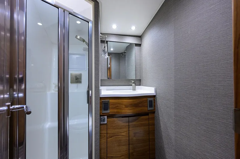 Lykenew Yacht Photos Pics Viking 54 LYKENEW- Master Head Sink & Shower