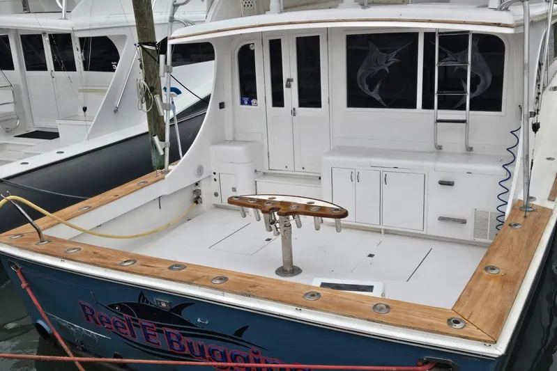  Yacht Photos Pics 1988 Topaz 44 Flybridge boat with spacious deck and fishing setup.