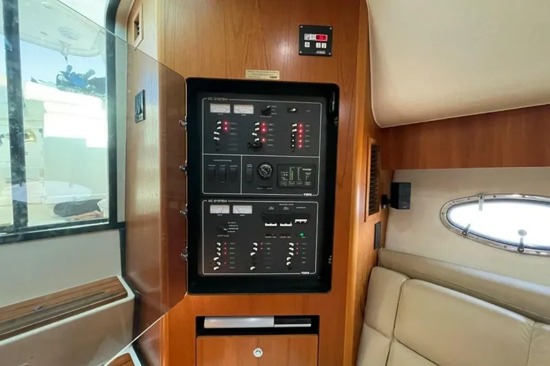 Bluefin Yacht Photos Pics Electrical panel inside 2000 Tiara 41 Open yacht, featuring DC and AC systems.
