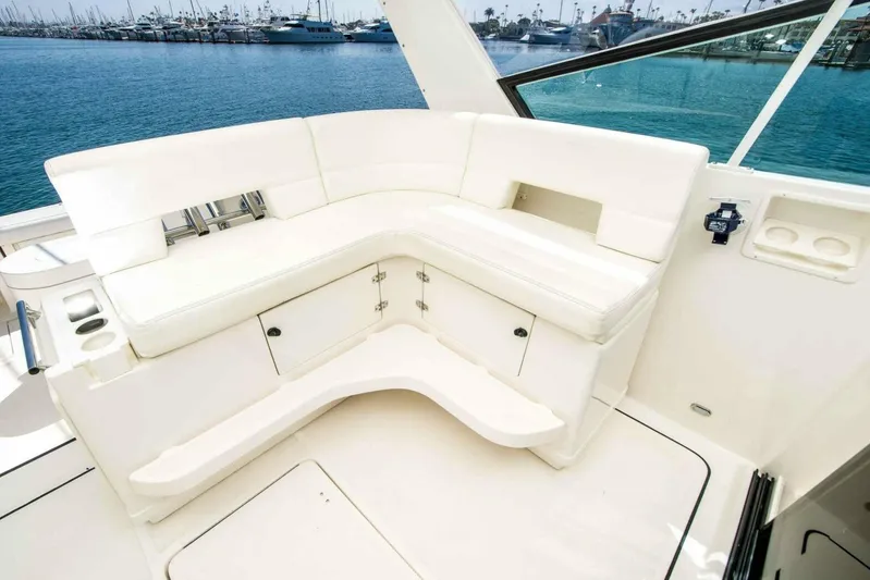 Bluefin Yacht Photos Pics Luxurious seating area on a 2000 Tiara 41 Open yacht, overlooking marina.