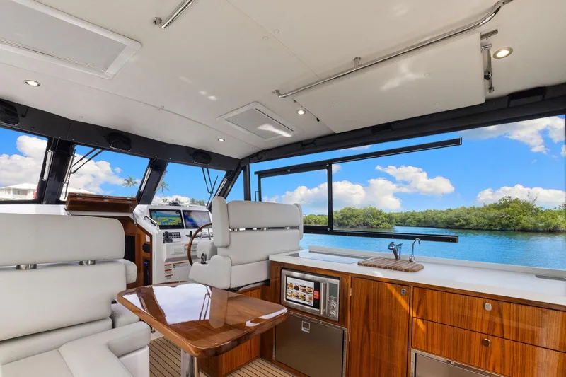 Mjm 42 For Sale Yacht Photos Pics Luxurious interior of 2024 MJM 42 yacht with scenic water view.