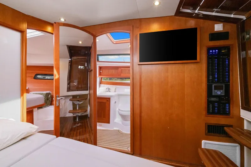 Mjm 42 For Sale Yacht Photos Pics Luxurious interior of 2024 MJM 42 yacht featuring wood finishes and modern amenities.