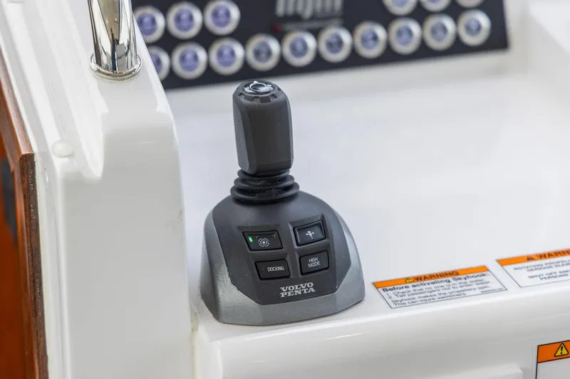 Mjm 42 For Sale Yacht Photos Pics Joystick control on 2024 MJM 42 boat dashboard with Volvo Penta branding.
