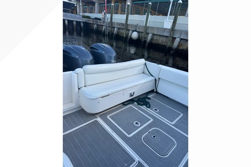  Yacht Photos Pics 2012 Contender 35 LS boat with twin engines and spacious seating area.