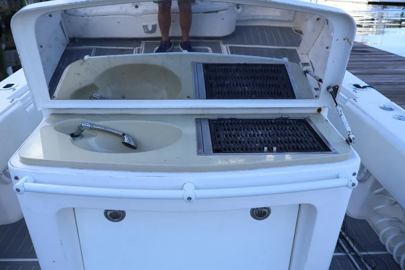 Yacht Photos Pics 2012 Contender 35 LS boat sink and grill station on deck.