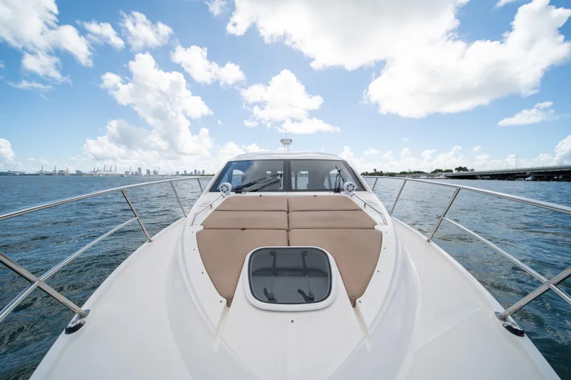  Yacht Photos Pics 2016 Sea Ray 400 Sundancer yacht on open water under a bright blue sky.