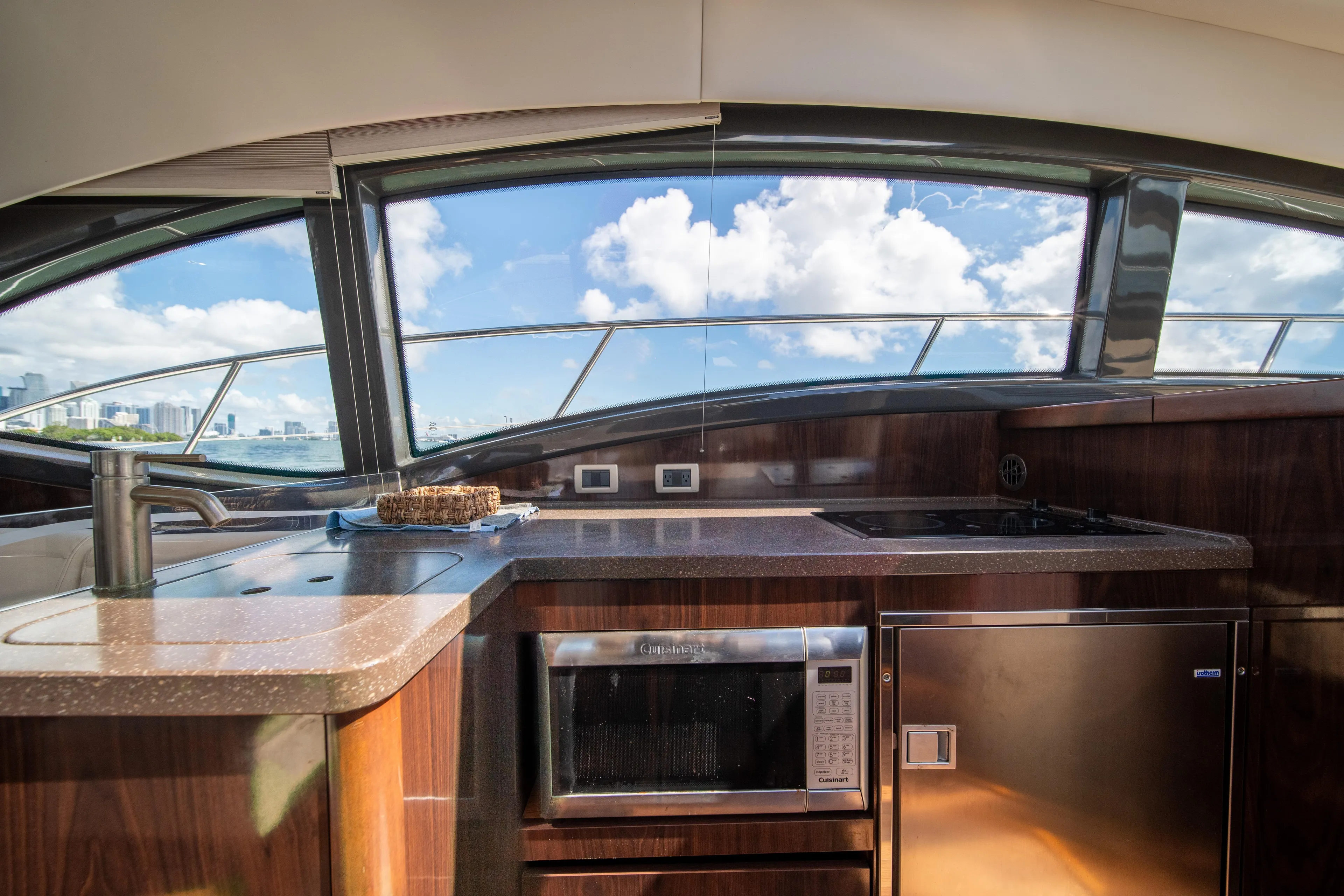  Yacht Photos Pics Luxurious interior of 2016 Sea Ray 400 Sundancer yacht with modern kitchen amenities.