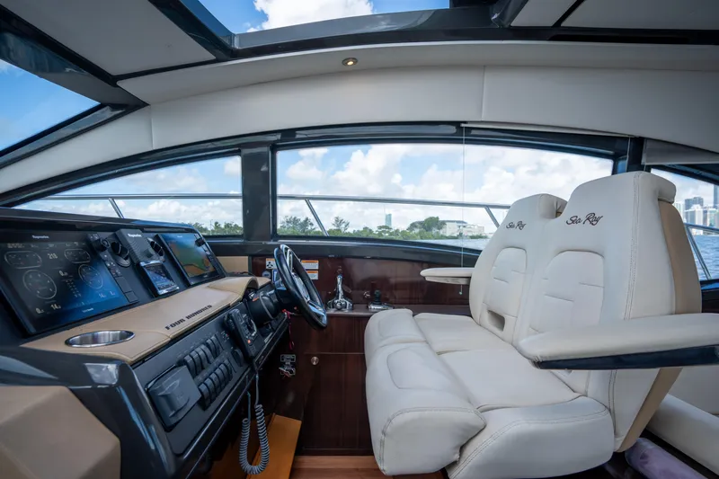  Yacht Photos Pics Luxurious 2016 Sea Ray 400 Sundancer yacht interior with modern dashboard and plush seating.