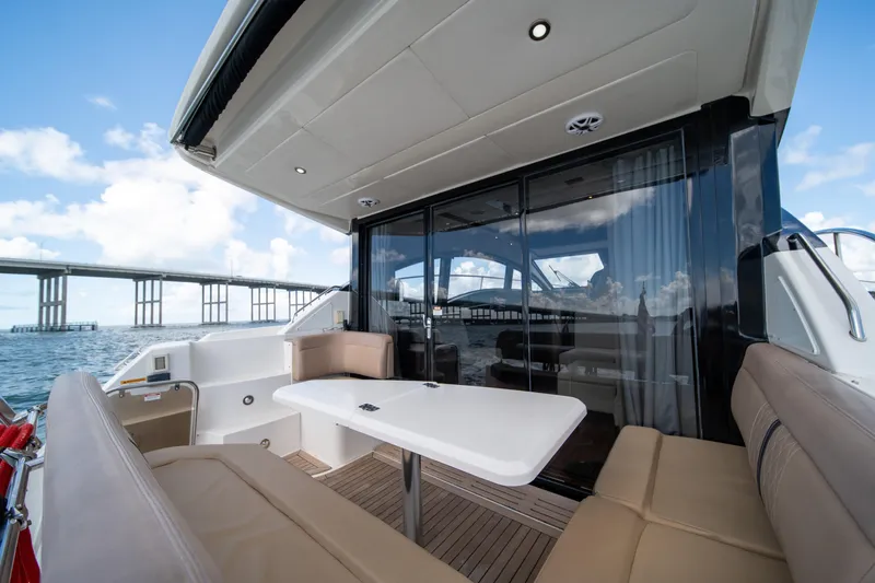  Yacht Photos Pics 2016 Sea Ray 400 Sundancer yacht interior with seating and table, bridge view.
