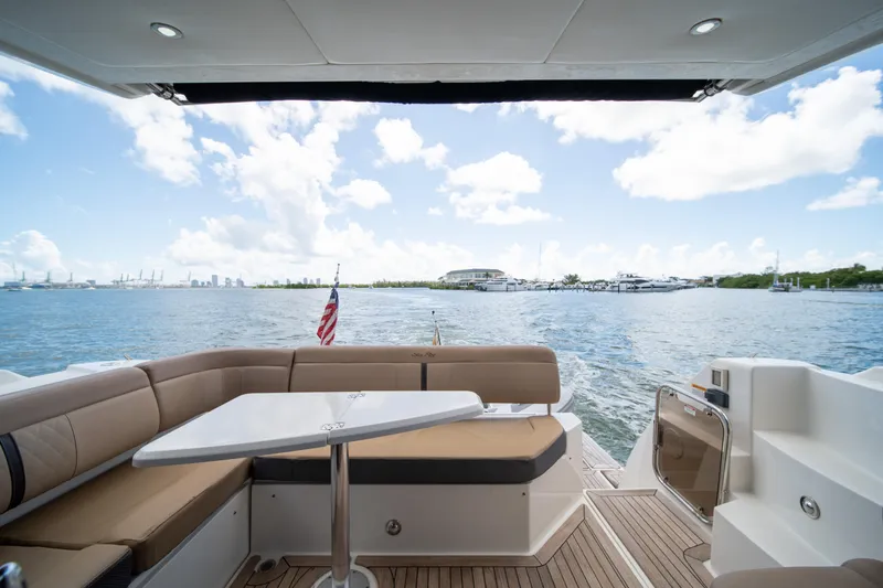  Yacht Photos Pics 2016 Sea Ray 400 Sundancer yacht with scenic waterfront view and comfortable seating.