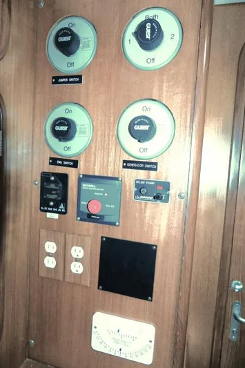 Peregrine Yacht Photos Pics Control panel of 2002 Tayana 460 Vancouver Pilothouse with switches and outlets.